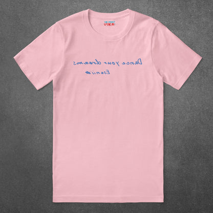 Dance Your Dreams T-Shirt by Eseniia in pink, flat lay with motivational message for dancers