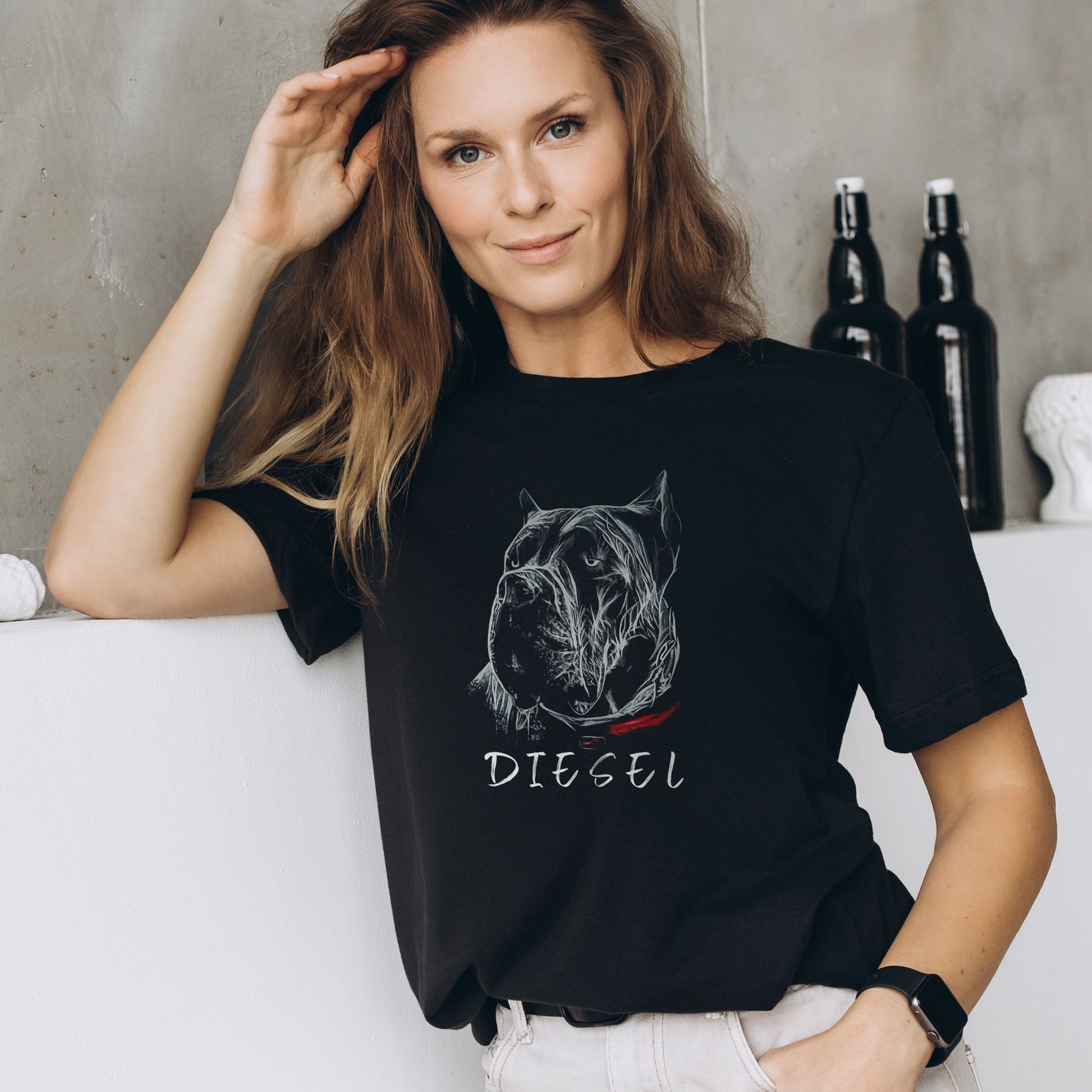 Woman wearing a black shirt with a personalized hand-drawn Cane Corso design, showcasing the custom details