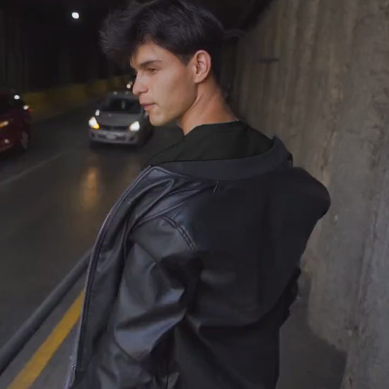 Video of a man wearing a black shirt with a personalized Cane Corso hand-drawn design, highlighting the fit and style