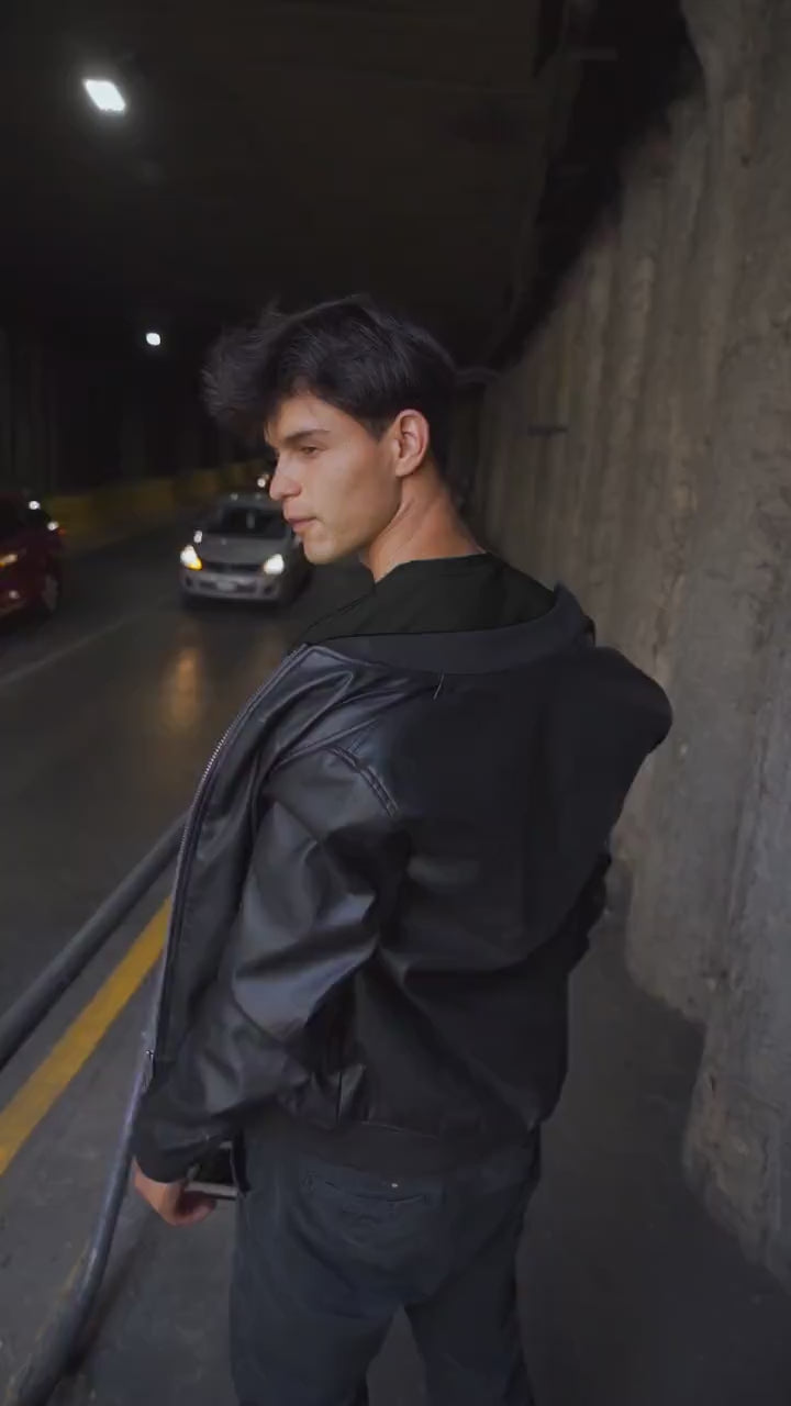 Video of a man wearing a black shirt with a personalized Cane Corso hand-drawn design, highlighting the fit and style